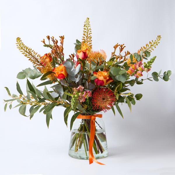 A Clockwork Orange (Eremurus / Orange roses / Kangaroo Paw/ Leucospermum / Antirrhinum / Eucalyptus)