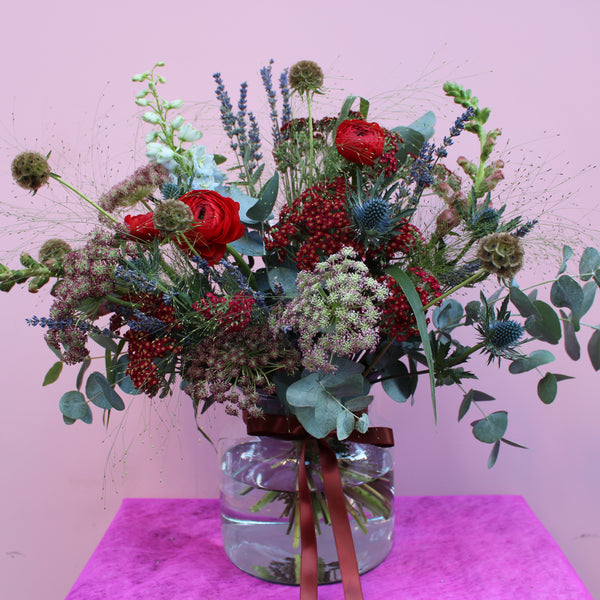 The Notebook (Wild and wondrous is the theme with this one in blues and reds with grasses, thistle, ranunculus, dried lavender and snapdragons. Not a rose in sight!)