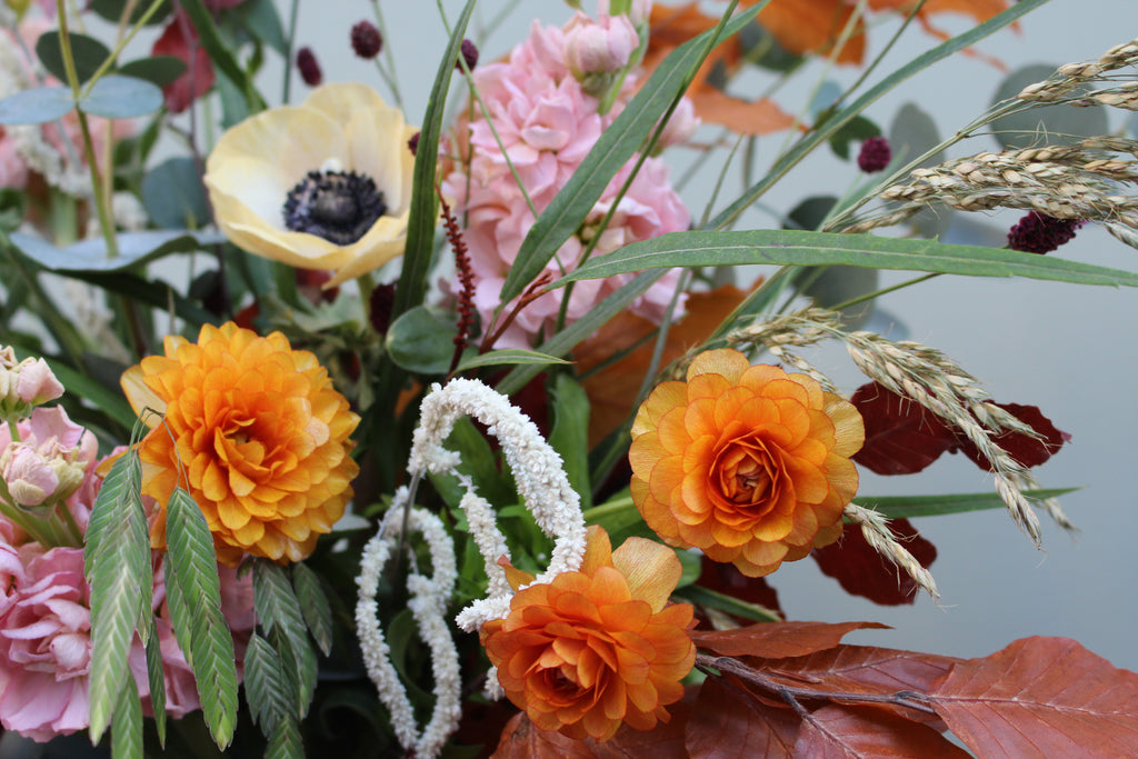 Gone With the Wind (A whimsical beauty containing anemones, butterfly ranunculus, scented stocks and a variety of grasses)