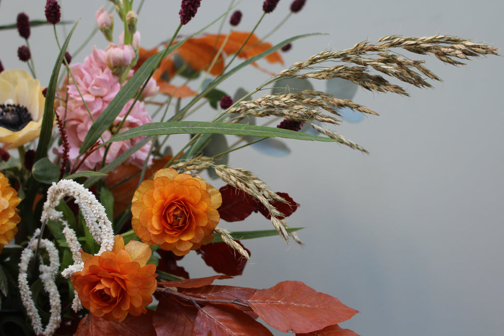 Gone With the Wind (A whimsical beauty containing anemones, butterfly ranunculus, scented stocks and a variety of grasses)