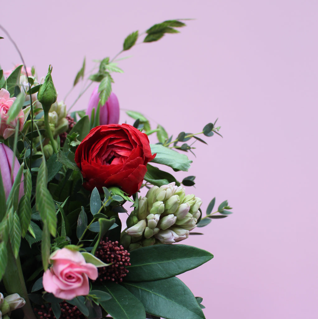 Pretty Woman (Spring is in the air with this bunch in reds, pinks and purples including roses, ranunculus, hyacinths and tulips)