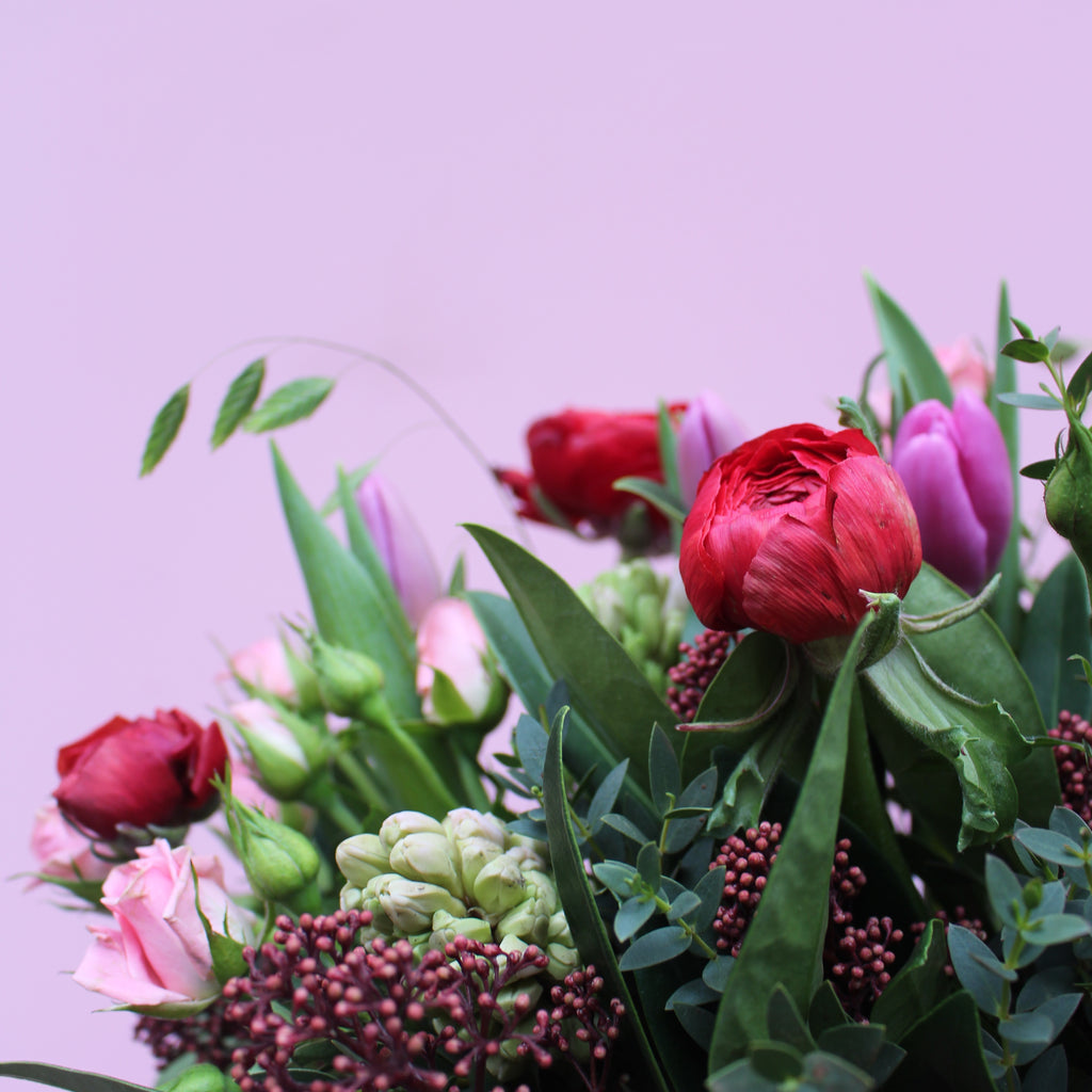 Pretty Woman (Spring is in the air with this bunch in reds, pinks and purples including roses, ranunculus, hyacinths and tulips)