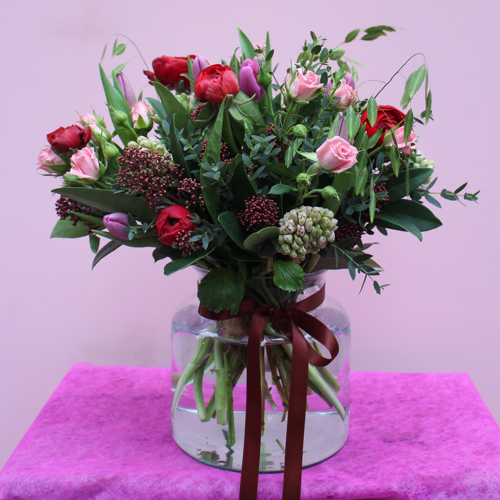 Pretty Woman (Spring is in the air with this bunch in reds, pinks and purples including roses, ranunculus, hyacinths and tulips)