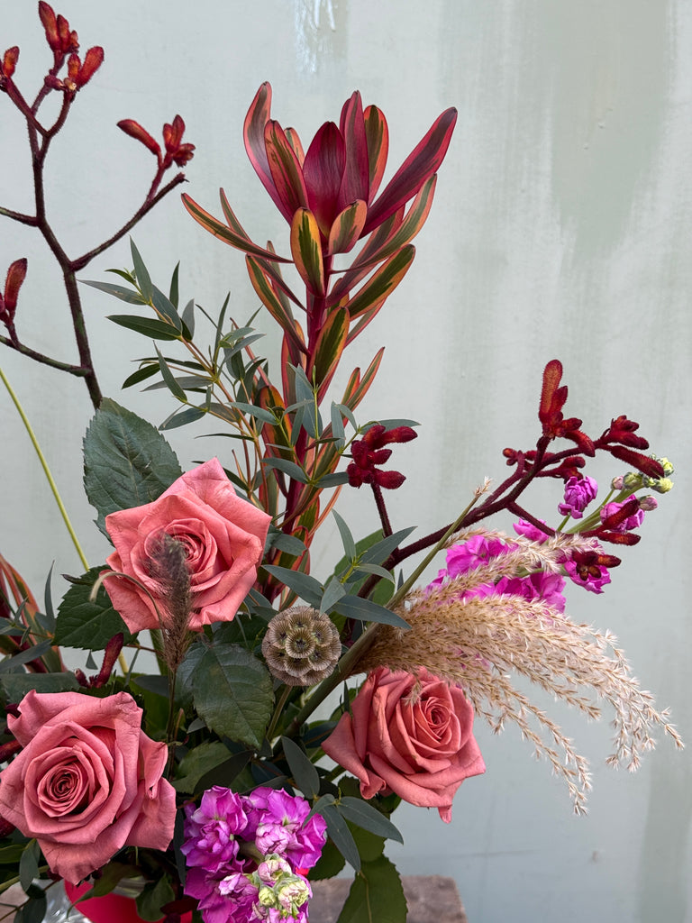 The Devil Wears Prada (A dark and luxurious bouquet with roses, scabious, leucadendron, kangaroo paw, scented stocks and grasses)