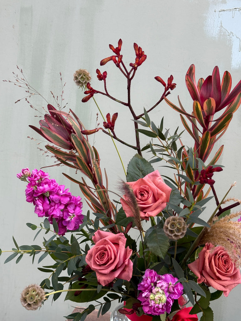 The Devil Wears Prada (A dark and luxurious bouquet with roses, scabious, leucadendron, kangaroo paw, scented stocks and grasses)