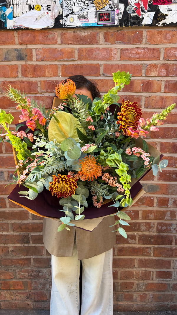 Oh My Gourd ('Fuego' Chrysanthemum / Leucospermum / Euphorbia / Anthurium / Snapdragon / Mollucella / Mimosa / Eucalyptus)