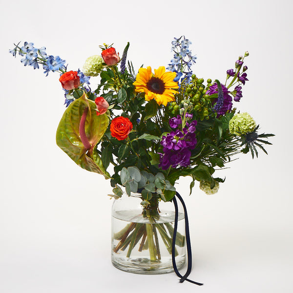 Crazy Sue (Delphinium / Anthurium / Stocks / Sunflowers / Roses / Veronica / Thistle / Viburnum)